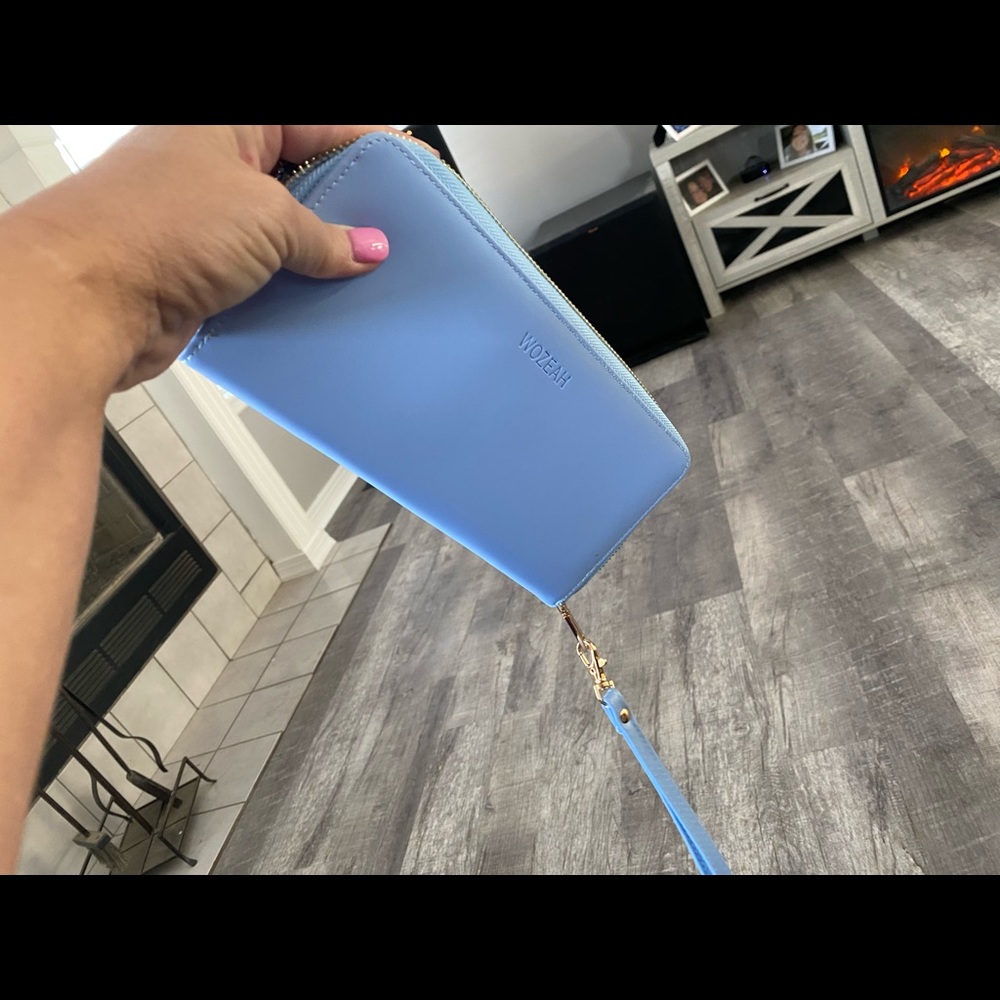 Baby blue wallet /purse . Never used